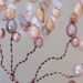 brown wire twisted branches adorned with sunstone beads and chips earthy tones and rustic design tree of life